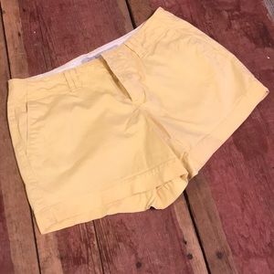 Yellow old navy shorts back pocket flaps